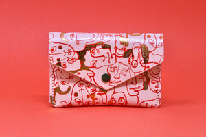 Many Faces Popper Purse